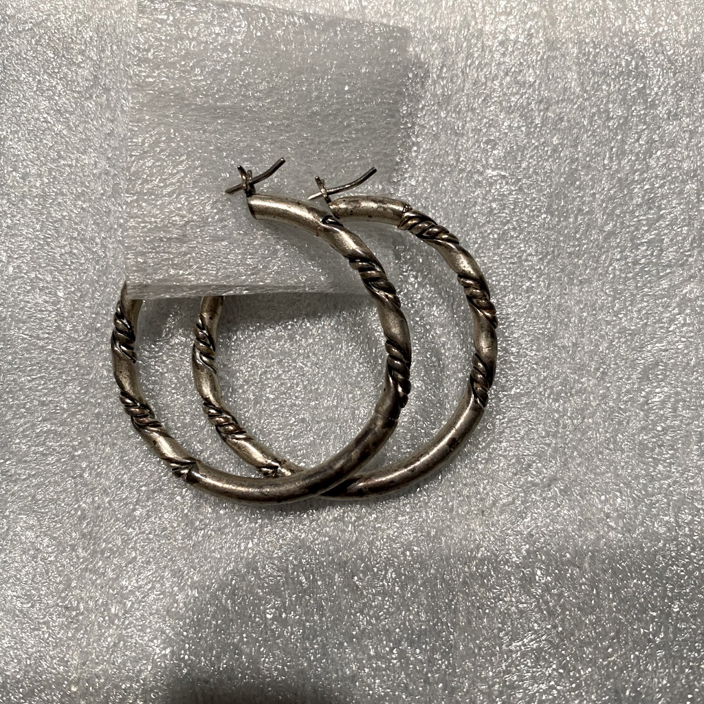 Silver Colored Hoops With Braiding Detail